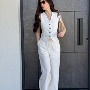 Ensemble pantalon et gilet de tailleur blanc cassé