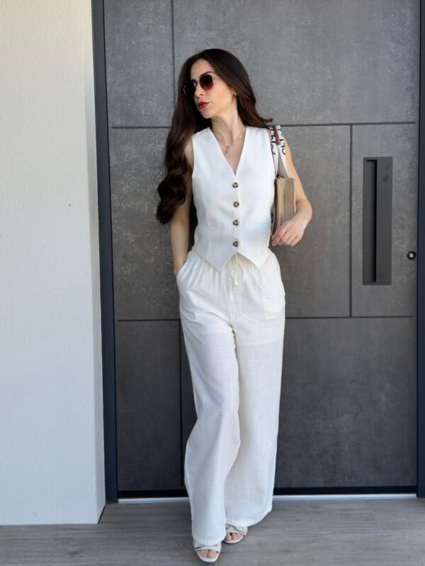 Ensemble pantalon et gilet de tailleur blanc cassé